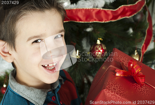 Image of Happy child receive the gift of Christmas