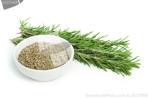 Image of Fresh rosemary and a bowl with dried