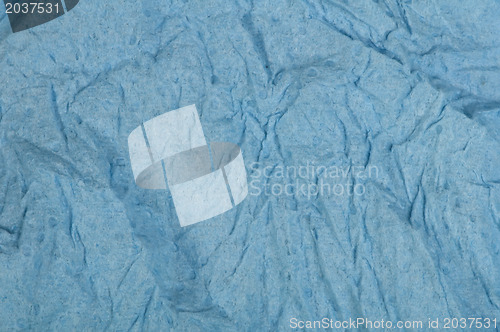 Image of Crumpled blue paper