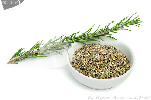 Image of Fresh rosemary and a bowl with dried