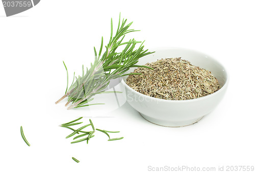 Image of Fresh rosemary and a bowl with dried