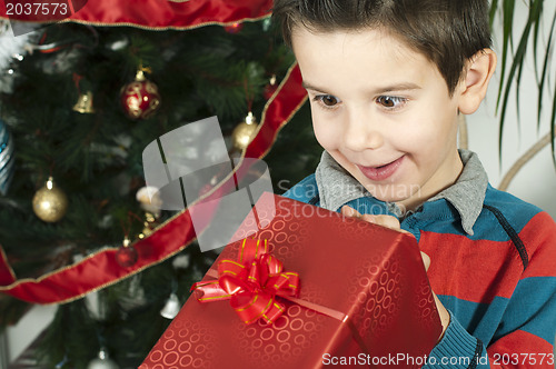 Image of Happy child receive the gift of Christmas