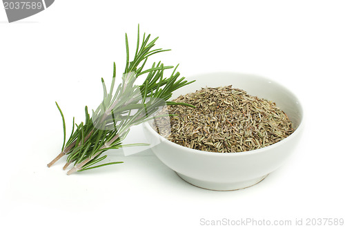 Image of Fresh rosemary and a bowl with dried