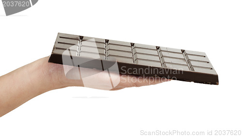 Image of Hand holding chocolate bar