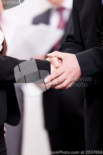 Image of handshake new contract deal business people