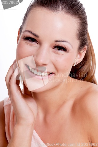 Image of young brunette woman with beautiful smile