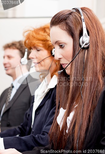 Image of callcenter service team talking with headset