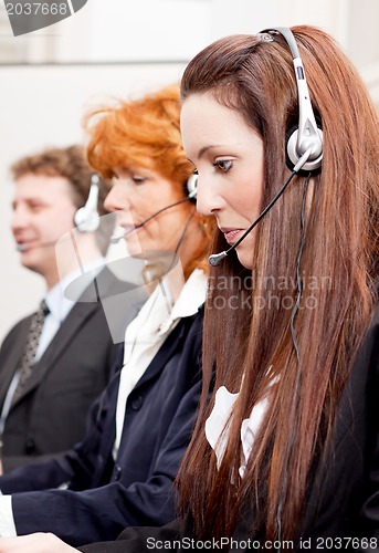 Image of callcenter service team talking with headset