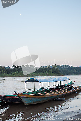 Image of Wooden long tail boats