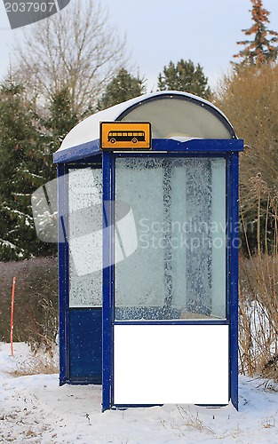 Image of Bus Stop in Winter with Blank Billboard