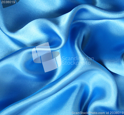 Image of Smooth elegant blue silk as background