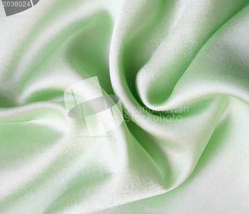 Image of Smooth elegant green silk as background