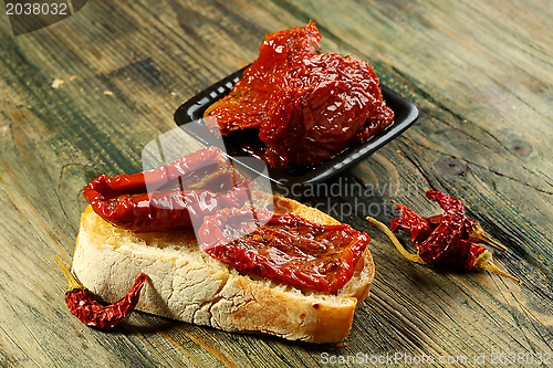 Image of Fresh bread with sun-dried tomatoes.