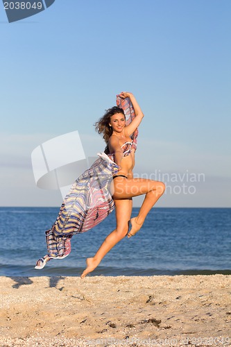 Image of Sexy smiling young woman