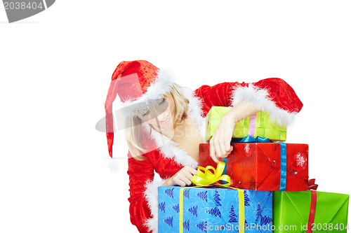 Image of Santa opening Xmas gifts