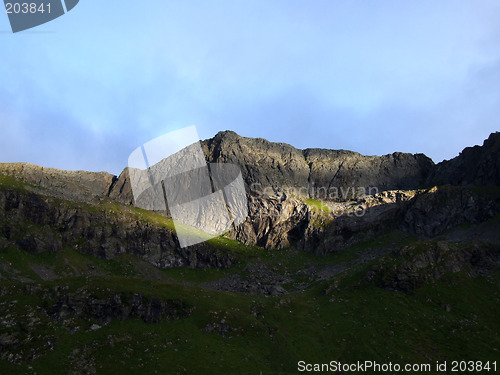 Image of Sunny patch on a dark mountain