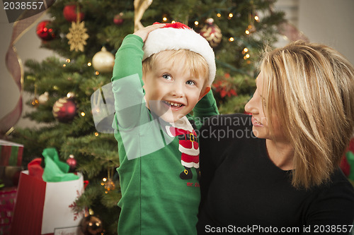 Image of Young Mother and Baby Son Christmas Portrait
