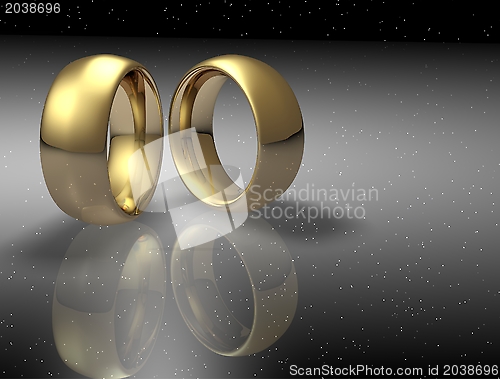 Image of Two wedding ring on a night sky background