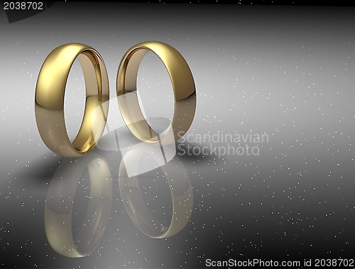 Image of Two wedding ring on a night sky background