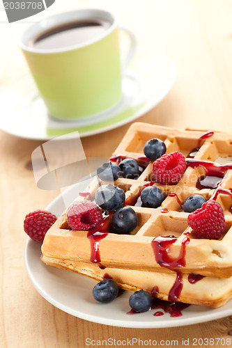 Image of tasty waffle with fruits