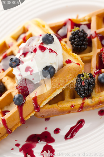 Image of tasty waffle with fruits