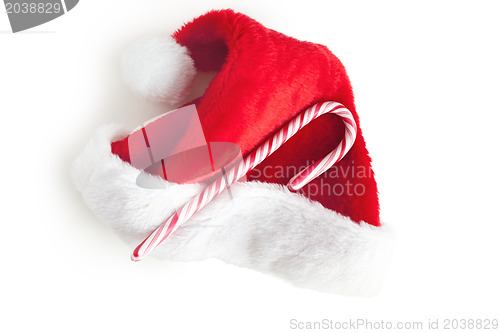 Image of stripy candy cane and xmas hat