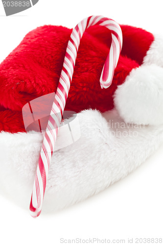 Image of stripy candy cane and xmas hat