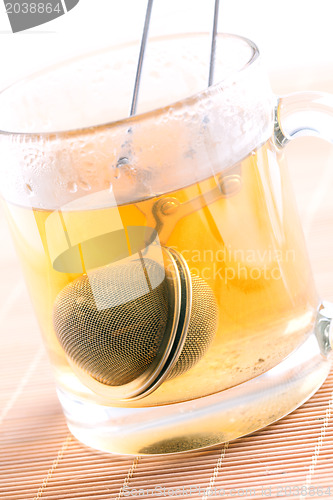 Image of tea strainer in cup