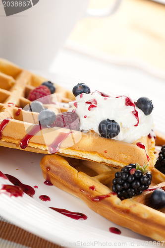 Image of tasty waffle with fruits