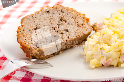 Image of baked meatloaf with potato salad