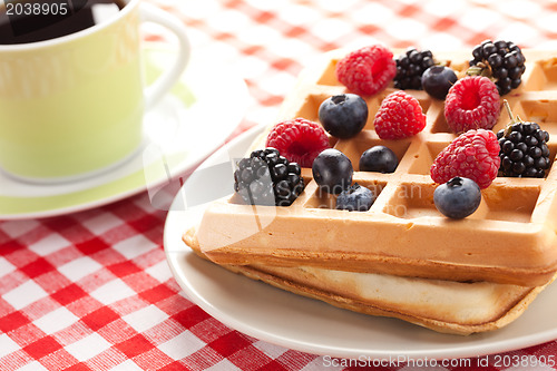 Image of tasty waffle with fruits