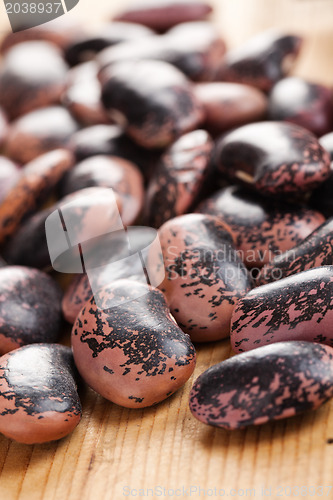 Image of color beans on wooden table