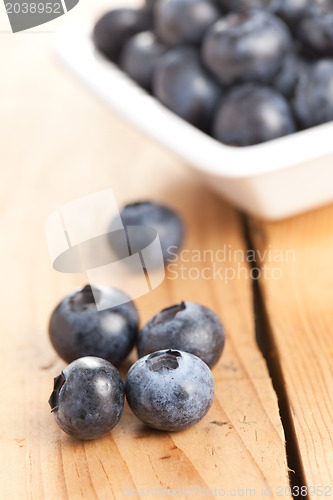 Image of blueberries on wooden table