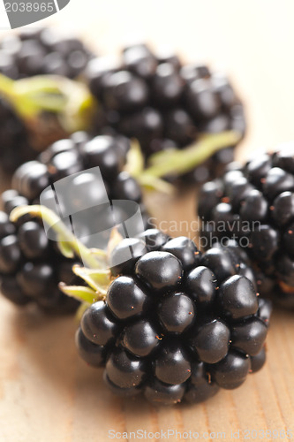 Image of blackberries on wooden table