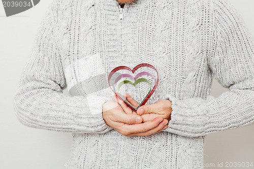 Image of Heart symbols held in hands