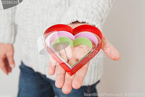 Image of Heart symbols held in hand