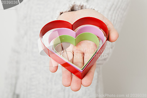 Image of Heart symbols held in hand