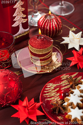 Image of Christmas candles with paper stars