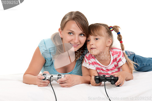 Image of Happy family playing a video game