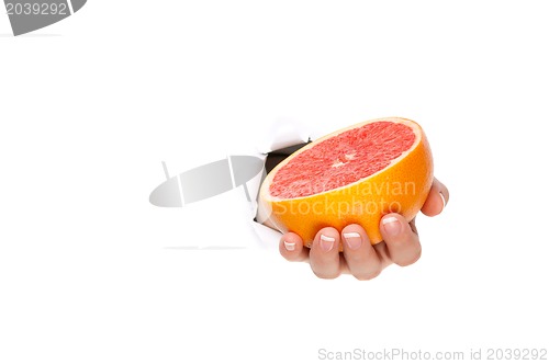 Image of Hand with grapefruit