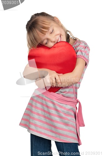 Image of Little girl with red heart