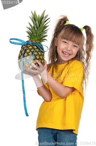 Image of Little girl with pineapple