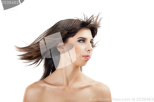 Image of beautiful young girl with flying hair