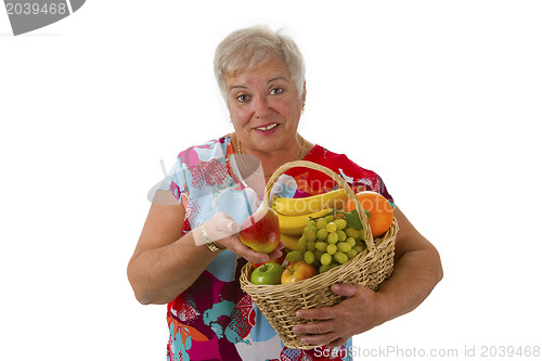 Image of Female senior with fresh fruits