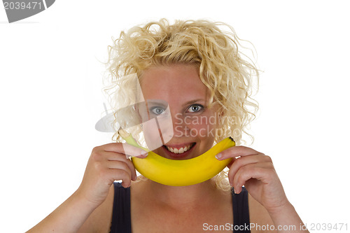 Image of Young woman with banana