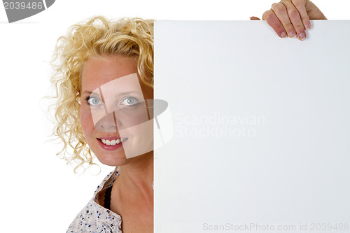 Image of Woman holding blank white message board