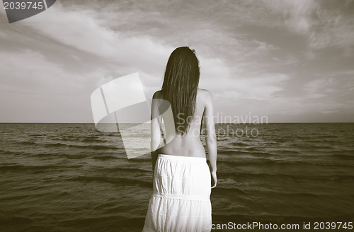 Image of Vintage photo of the woman and sea