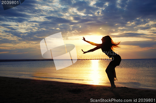 Image of Dancing in sunset sea
