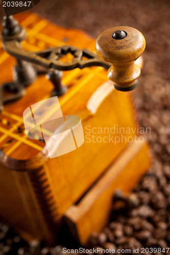 Image of detail of antique coffee mill