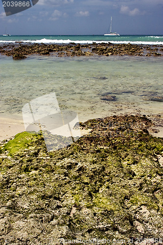 Image of beach rock and stone cabin in  republica dominicana